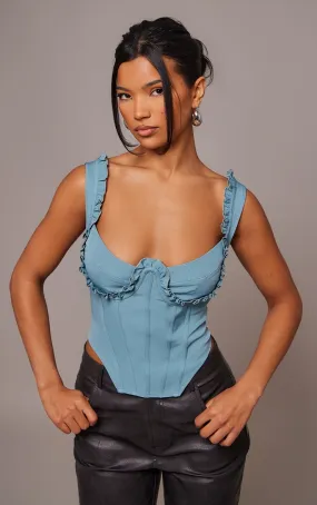 Corset bleu délavé à lacets dans le dos et volants sur le buste